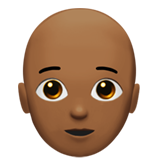 pessoa: pele morena escura e careca