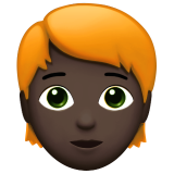 pessoa: pele escura e cabelo vermelho