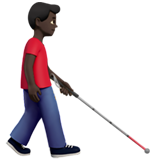 homem com bengala para cego: pele escura e de frente para a direita