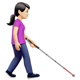 mulher com bengala para cego: pele clara e de frente para a direita