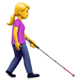 mulher com bengala para cego: de frente para a direita