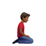 homem ajoelhando: pele morena escura e de frente para a direita