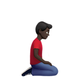 homem ajoelhando: pele escura e de frente para a direita