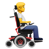 pessoa em cadeira de rodas motorizada: de frente para a direita